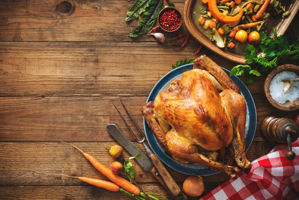 Thanksgiving turkey on rustic wooden table